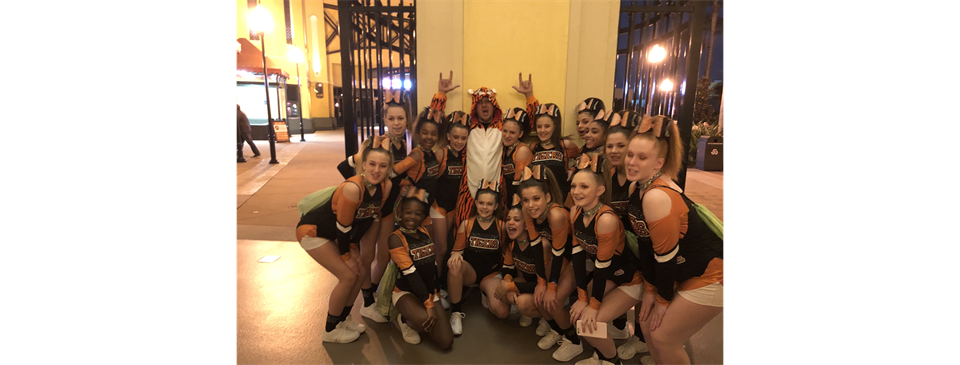 A1 pumped with their mascot before they take the mats at Nationals!